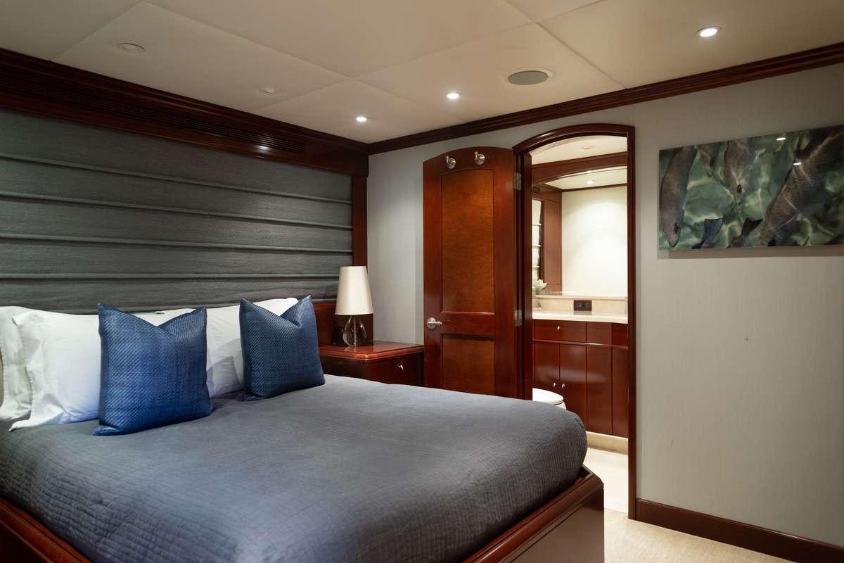 a bed in a room aboard ODIN Yacht for Charter