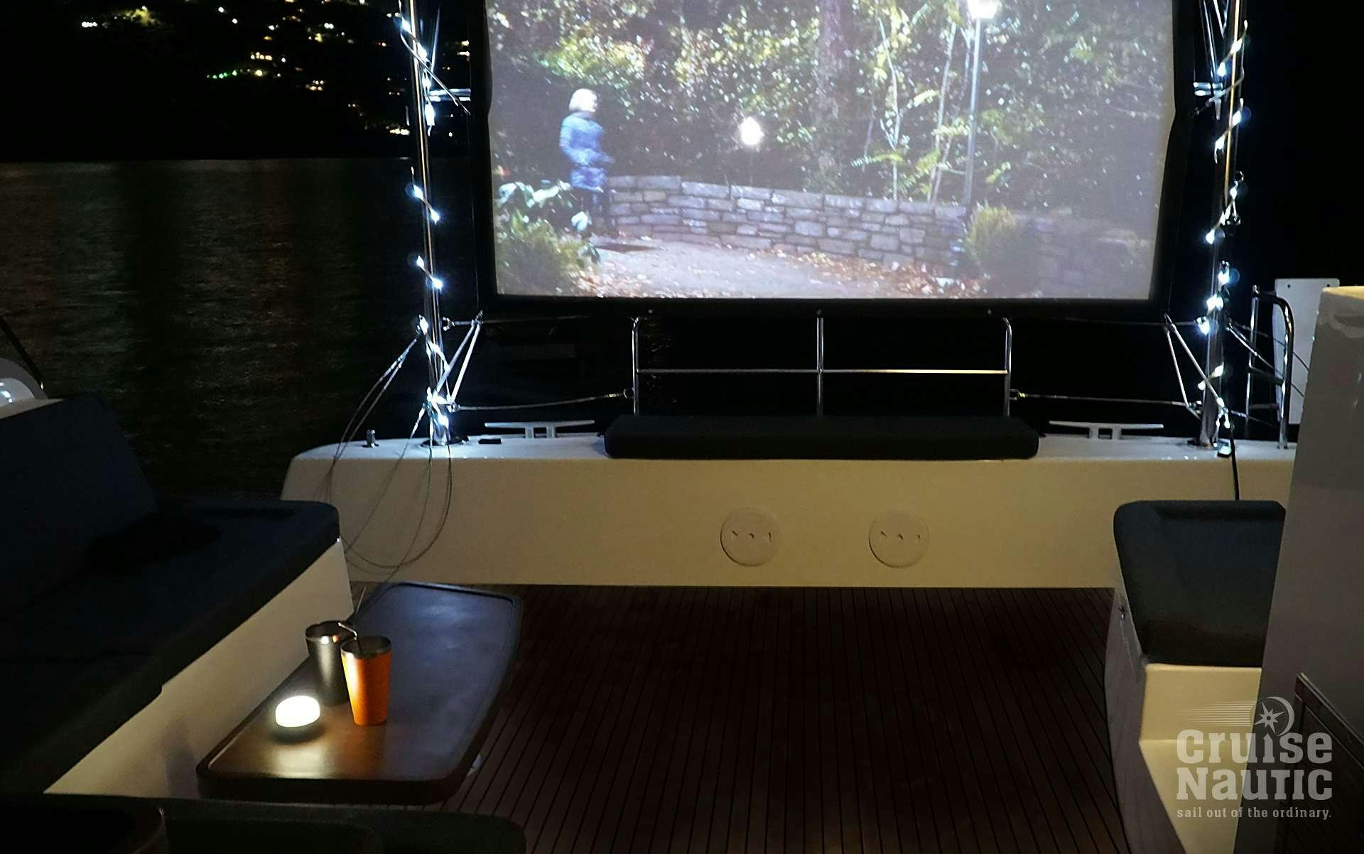 a tv on a stand aboard CruiseNautic Yacht for Charter