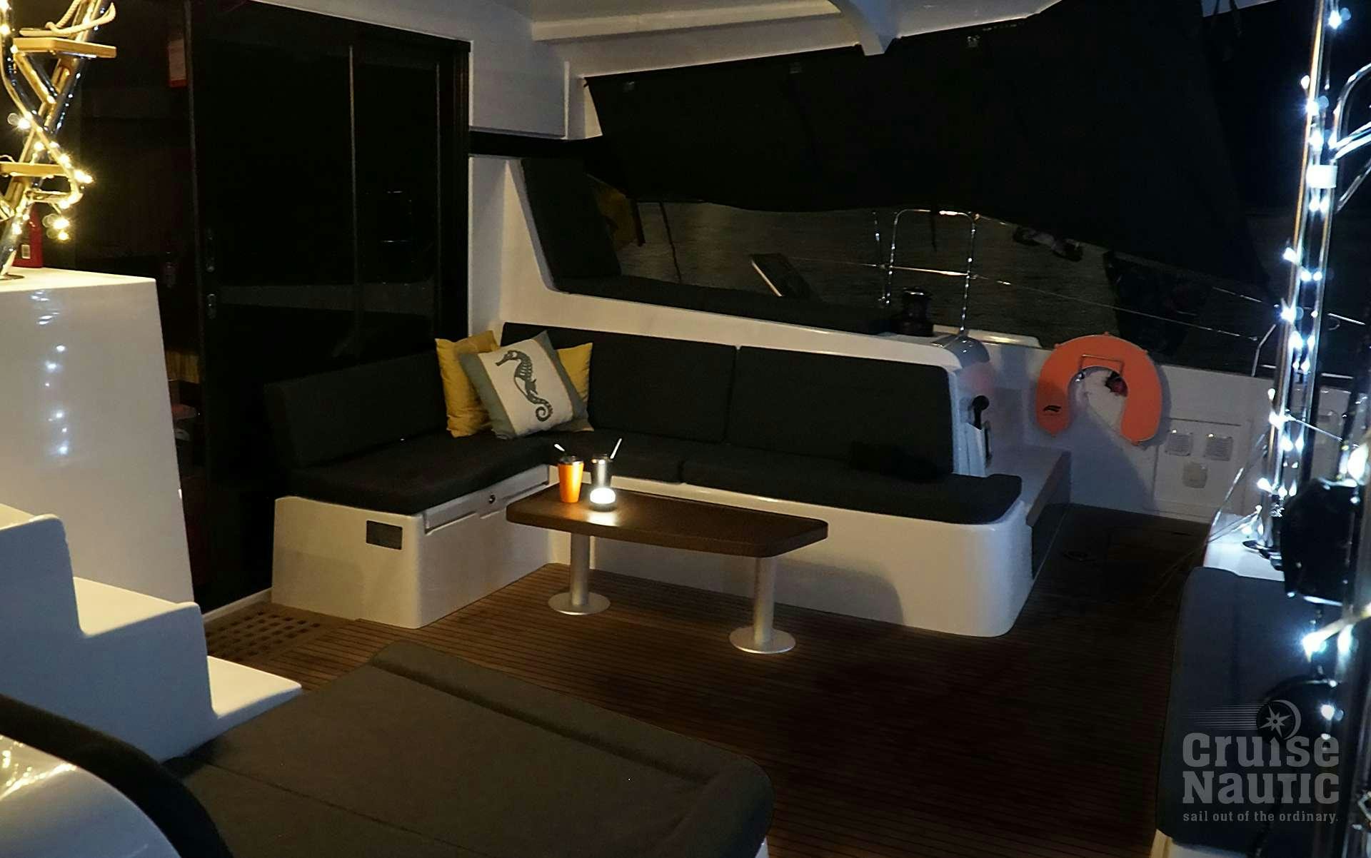 a room with a desk and a computer aboard CruiseNautic Yacht for Charter