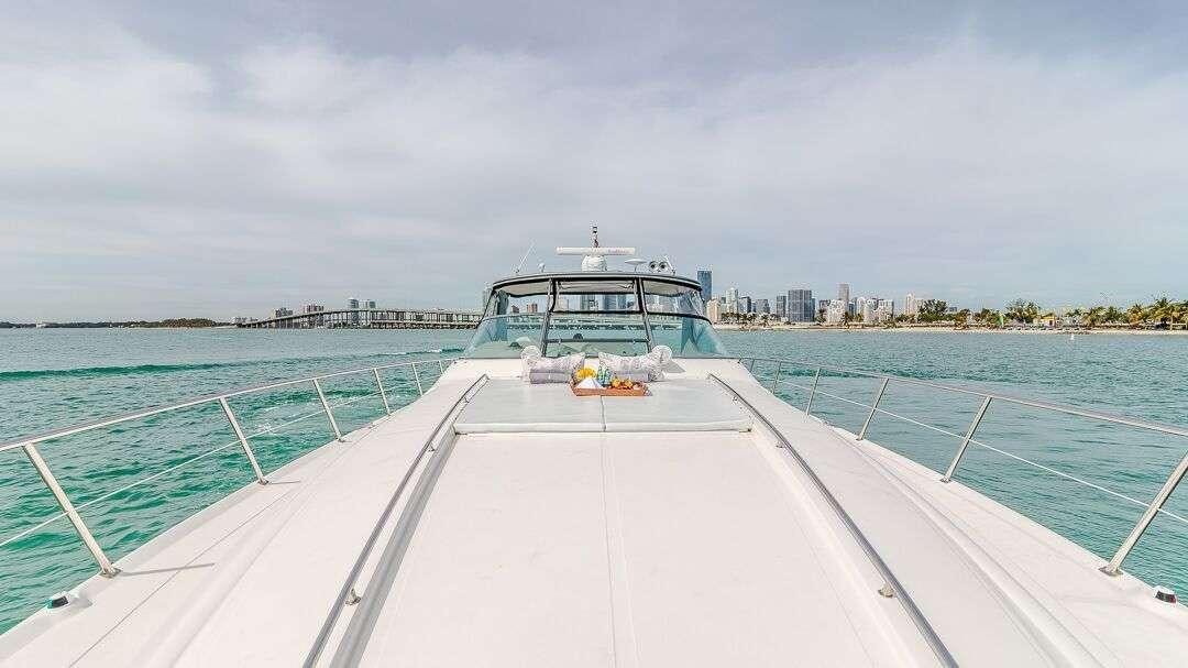 a boat on a body of water aboard WHY NOT Yacht for Charter