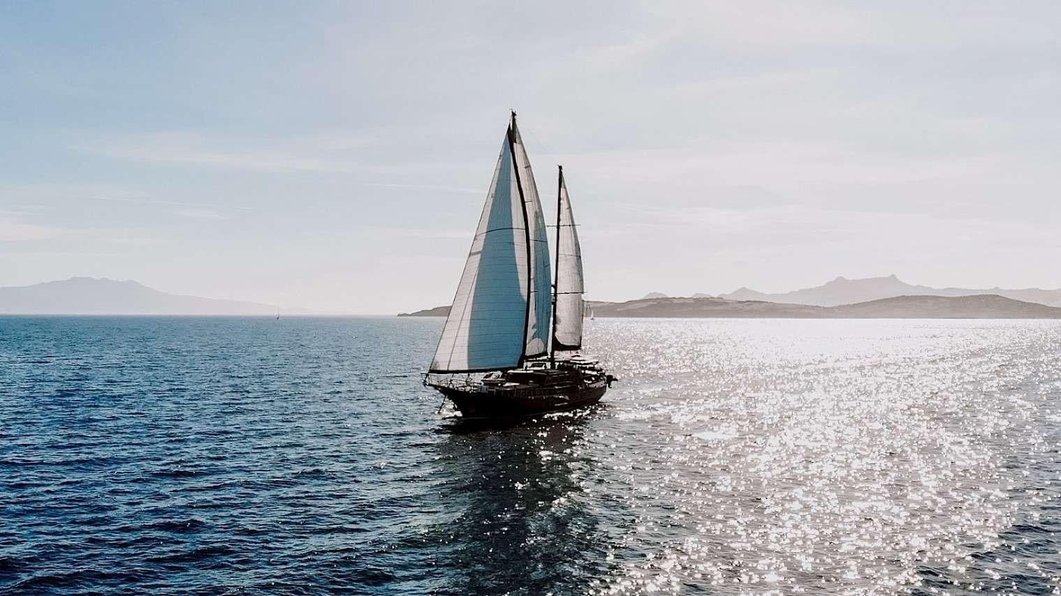 a sailboat in the water aboard CAPRICORN 1 Yacht for Charter