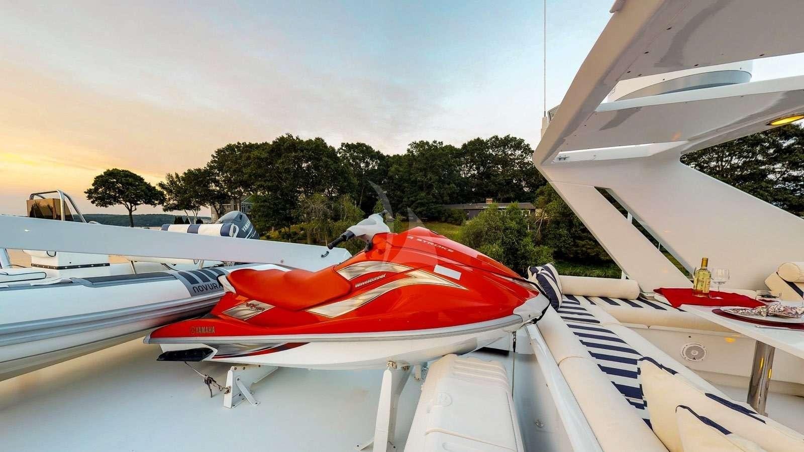 a row of boats on a dock aboard XOXO Yacht for Charter