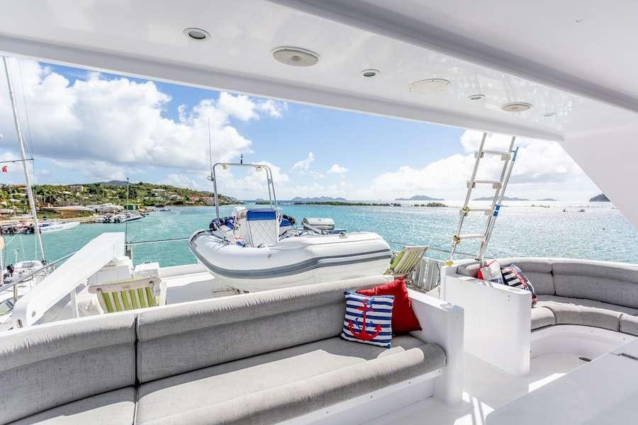 a boat on a deck aboard PRIME TIME Yacht for Charter
