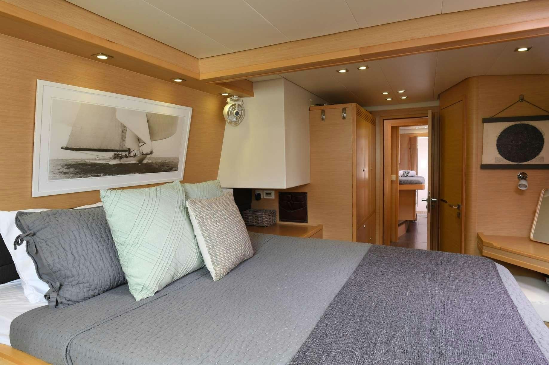 a bed in a hotel room aboard VIRAMAR Yacht for Charter