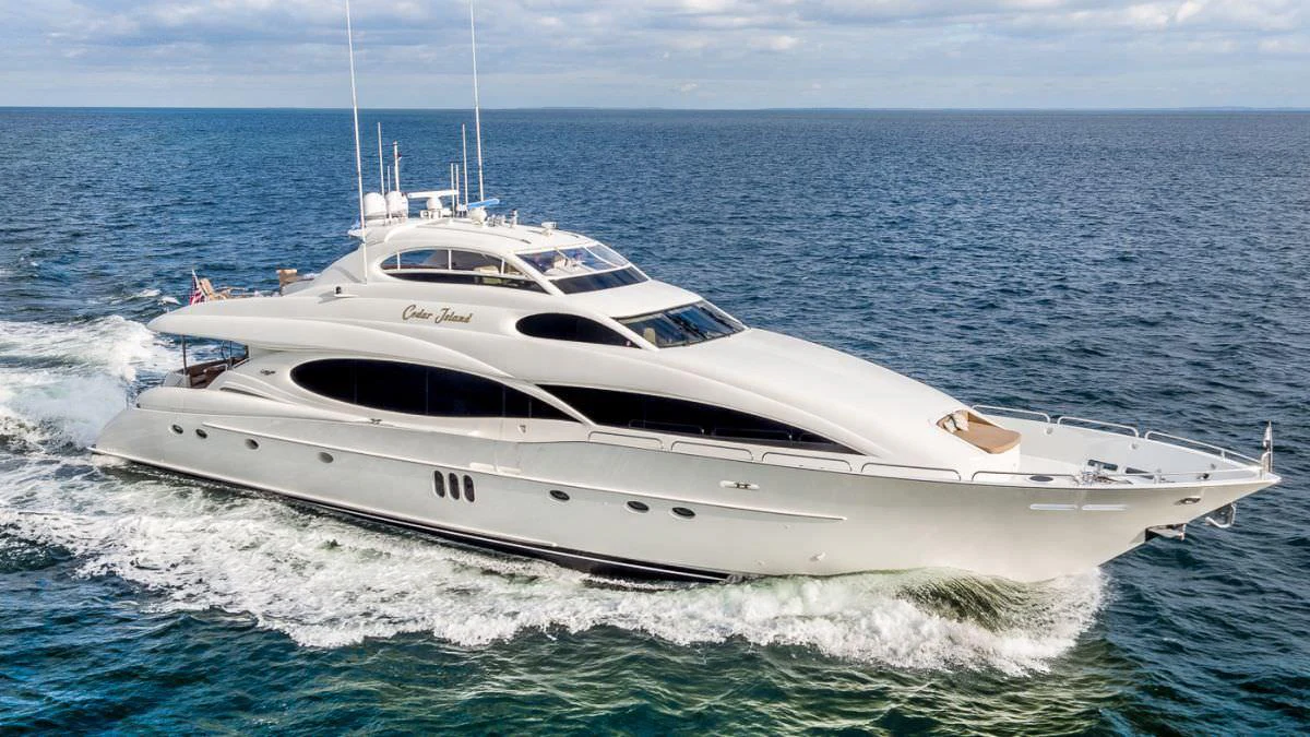 a white yacht on the water aboard CEDAR ISLAND Yacht for Charter