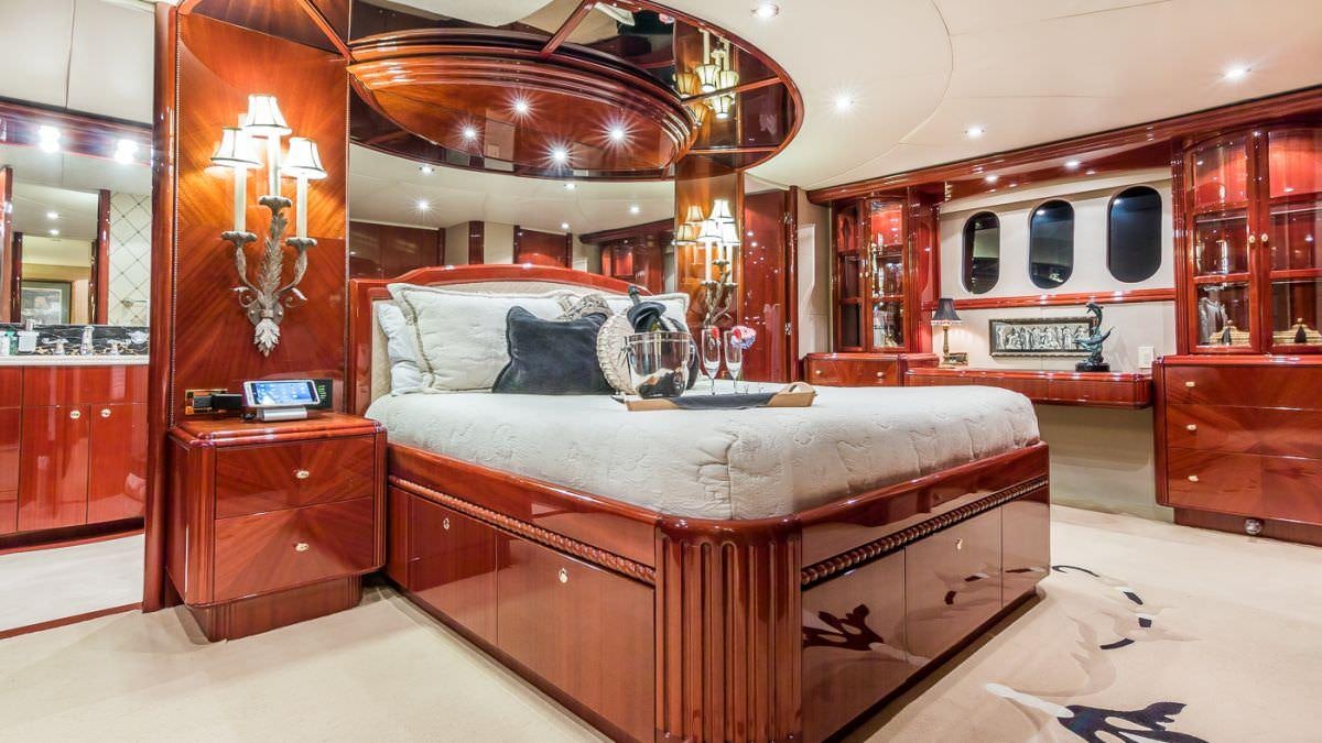 a bed in a room aboard CEDAR ISLAND Yacht for Charter