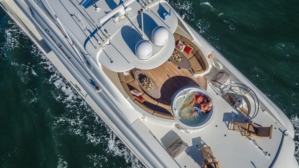 a boat with a person in it aboard CEDAR ISLAND Yacht for Charter