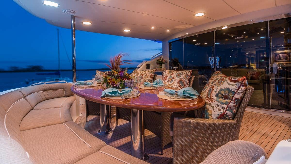 a dining table in a room aboard CEDAR ISLAND Yacht for Charter