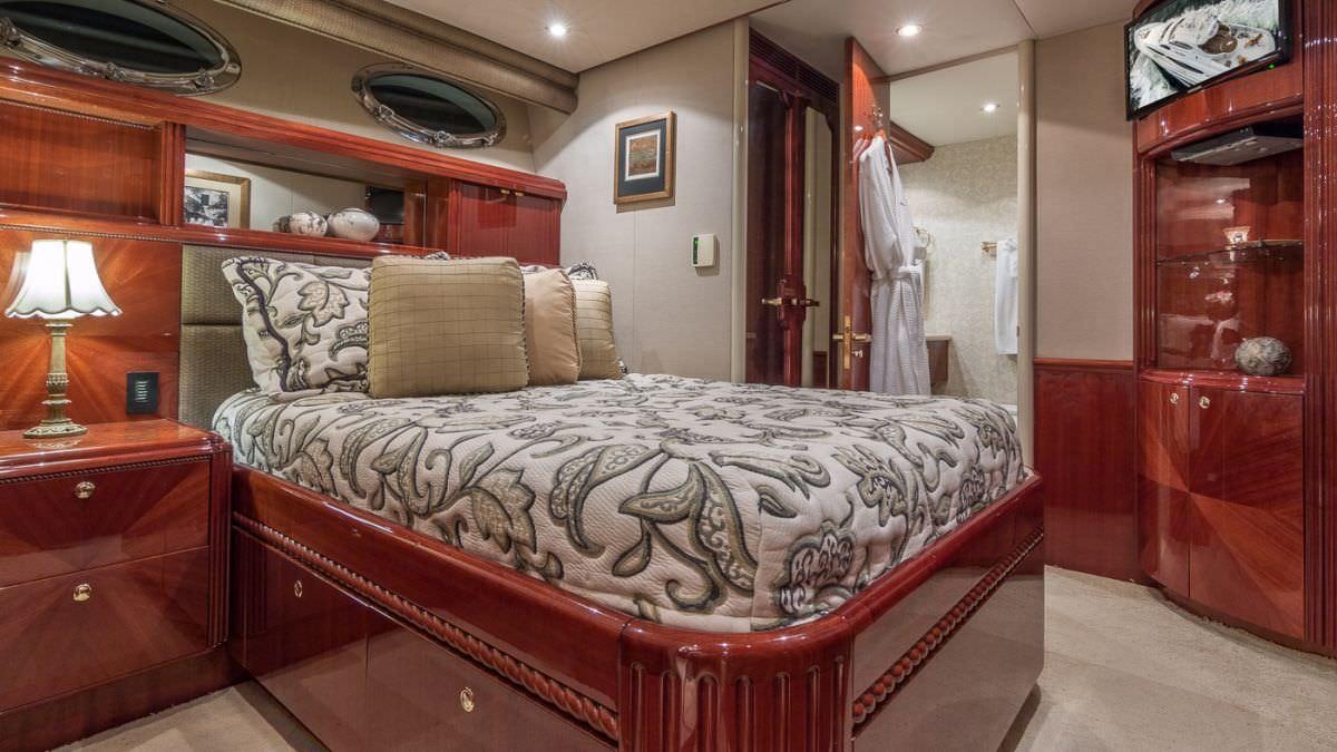a bed in a room aboard CEDAR ISLAND Yacht for Charter