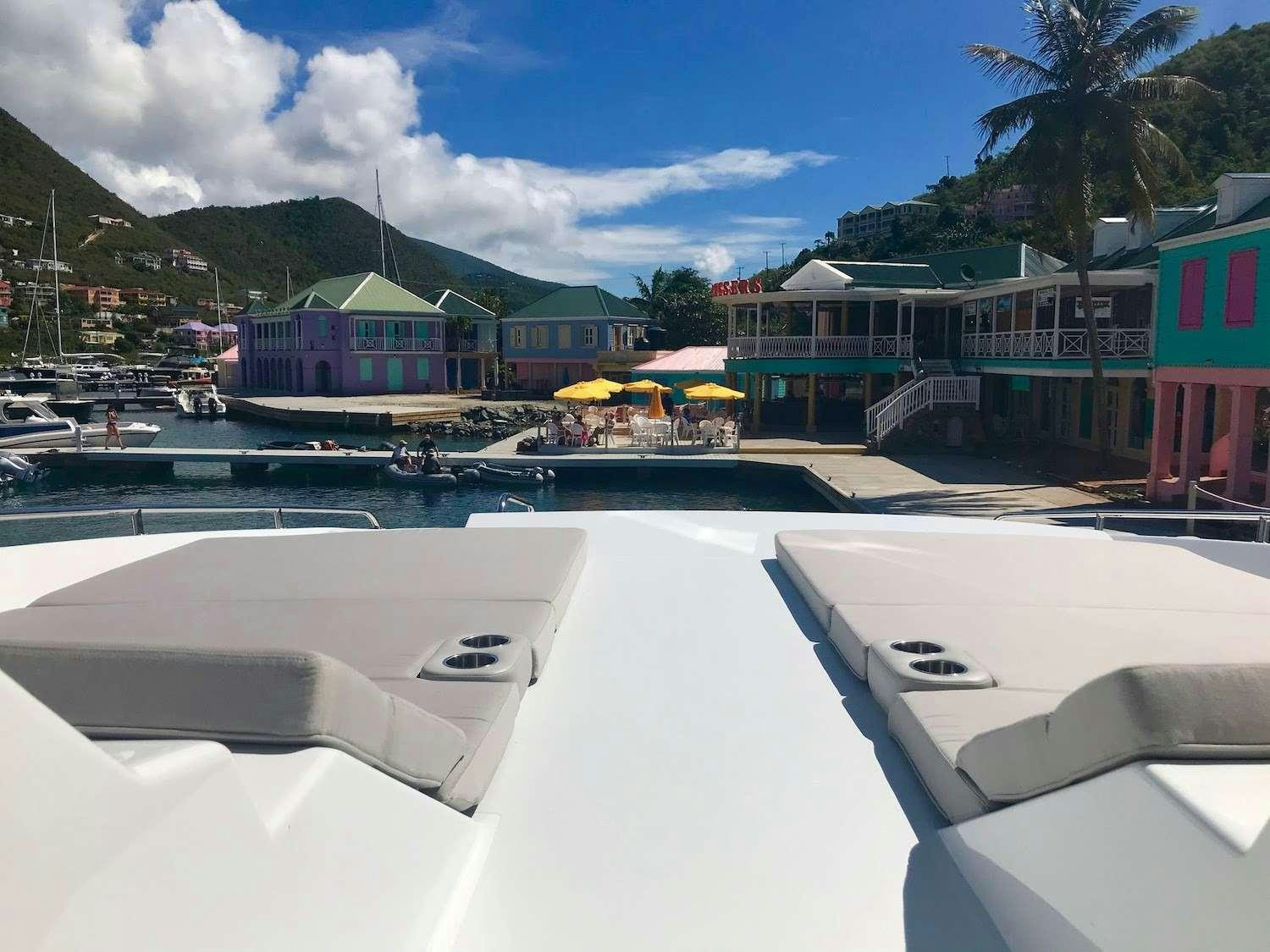 a group of boats in a harbor aboard VOYAGE 650 POWER CAT Yacht for Charter