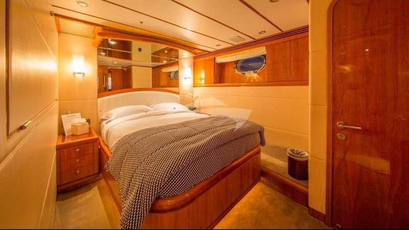 a couple of beds in a room aboard ANDIAMO Yacht for Charter