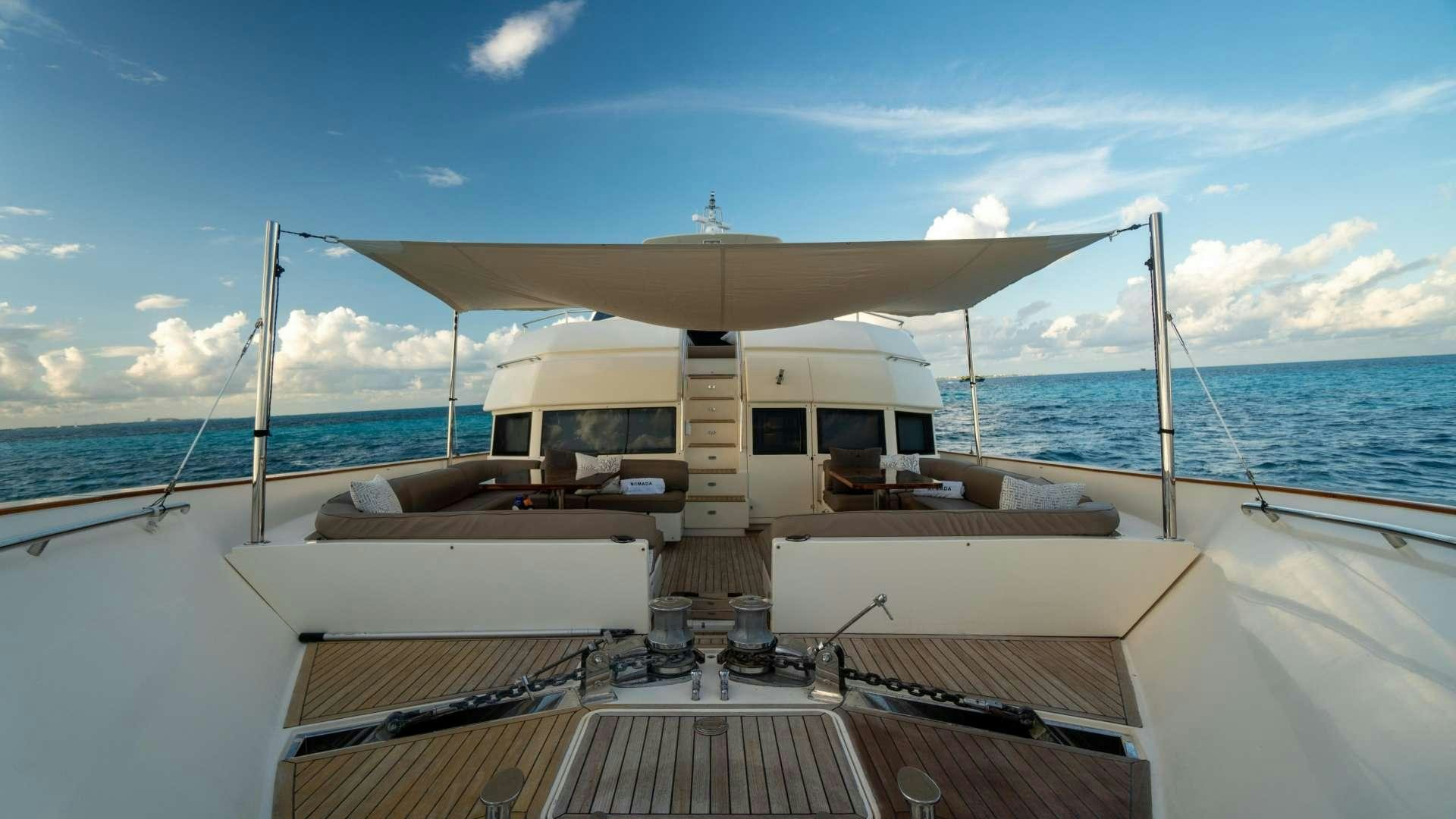 a boat on the water aboard NOMADA Yacht for Charter