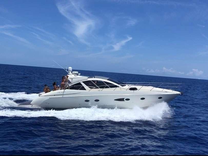 a white yacht in the water aboard SOL Yacht for Charter