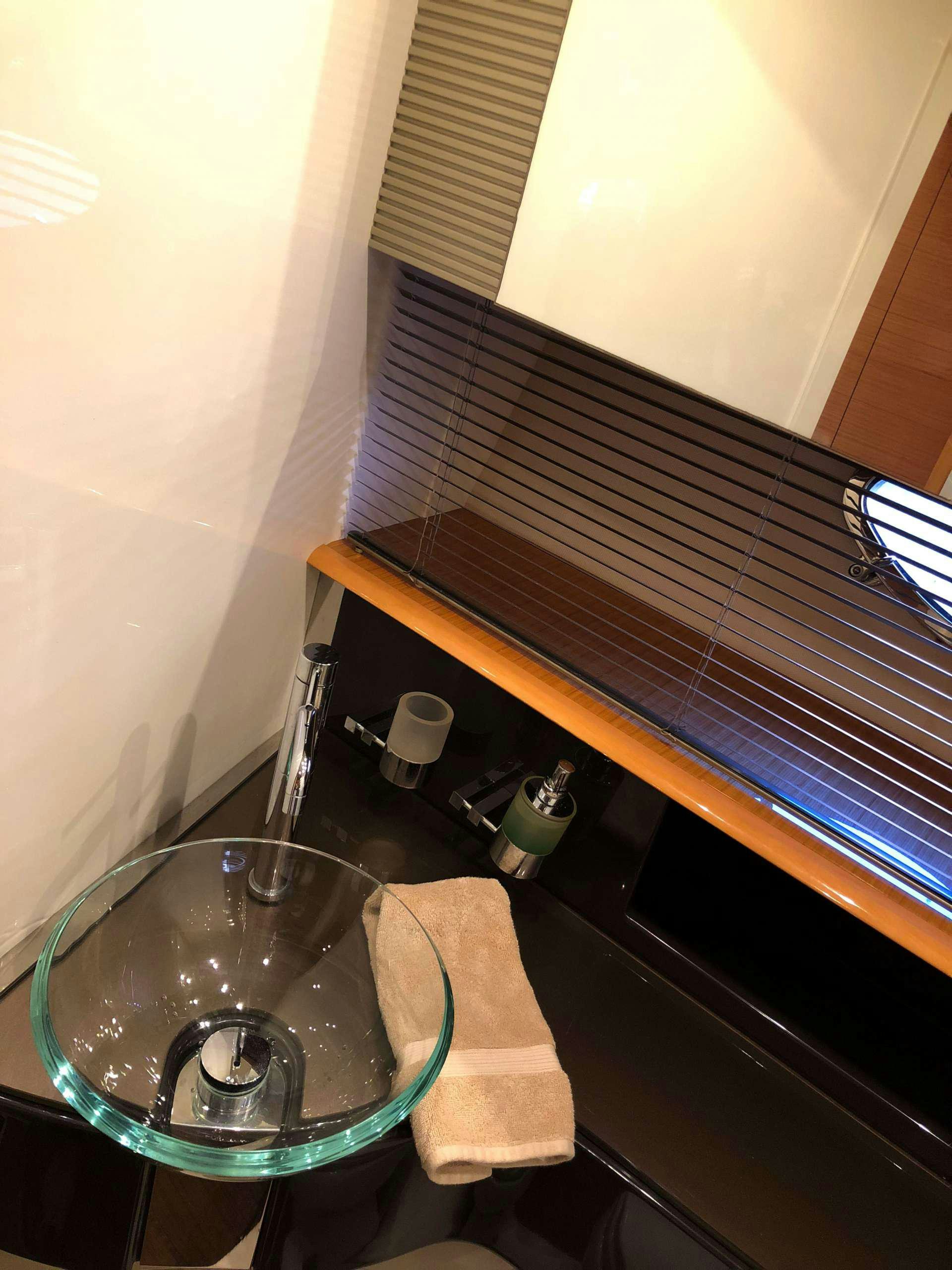 a sink with a faucet aboard SOL Yacht for Charter