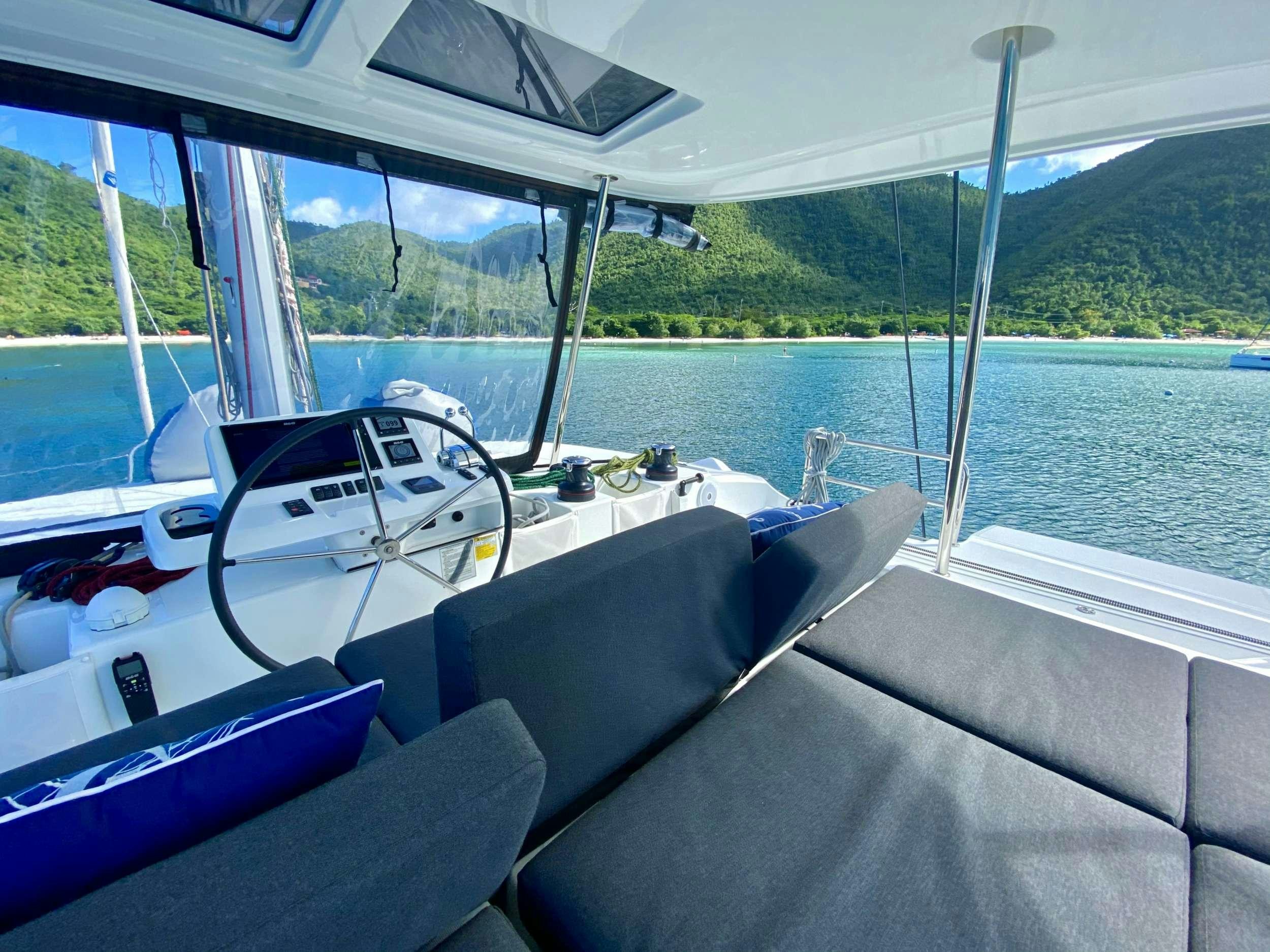 a boat on the water aboard NAUTI CAT Yacht for Charter