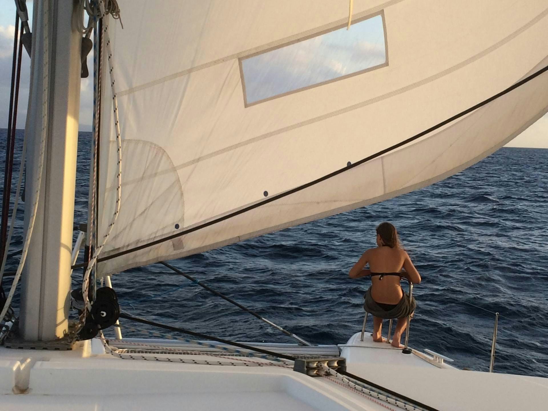 a person standing on a boat aboard HARMONY Yacht for Charter