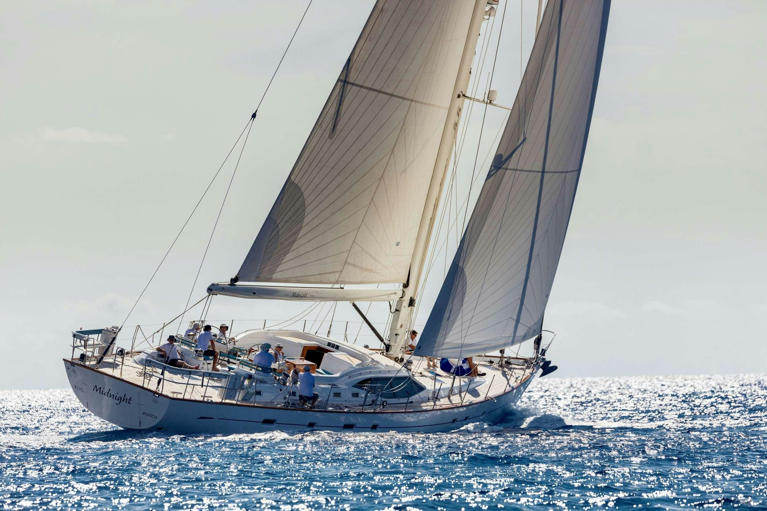 a sailboat on the water aboard MIDNIGHT Yacht for Charter