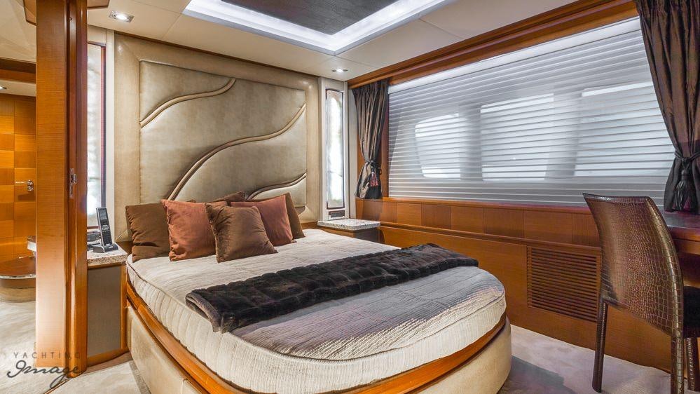 a bed in a room aboard 105 YCG Yacht for Charter