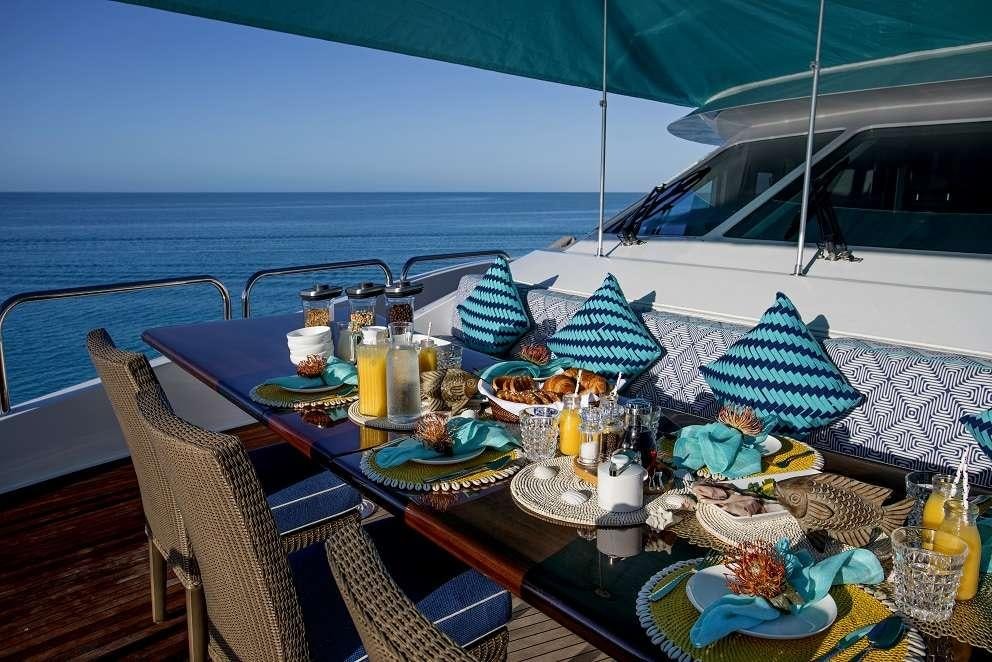 a table with food on it aboard SWEET ESCAPE Yacht for Charter