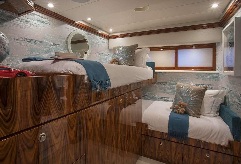 a couple of beds in a room aboard SWEET ESCAPE Yacht for Charter