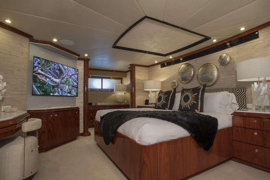 a bedroom with a large bed aboard SWEET ESCAPE Yacht for Charter
