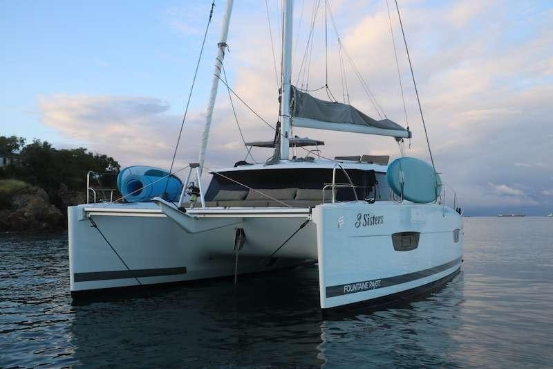 a white boat in the water aboard 3 SISTERS Yacht for Charter