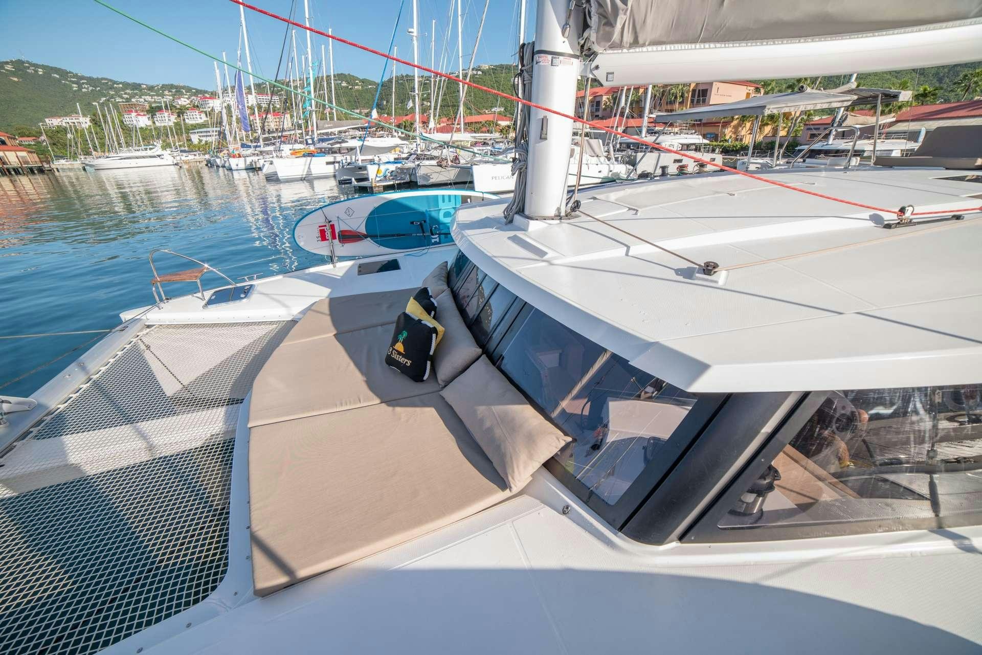 a boat in a harbor aboard 3 SISTERS Yacht for Charter