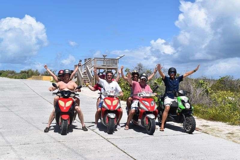 a group of people on motorcycles aboard 3 SISTERS Yacht for Charter