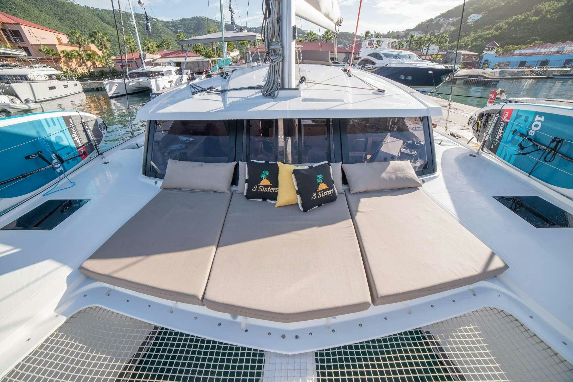 a boat in a harbor aboard 3 SISTERS Yacht for Charter