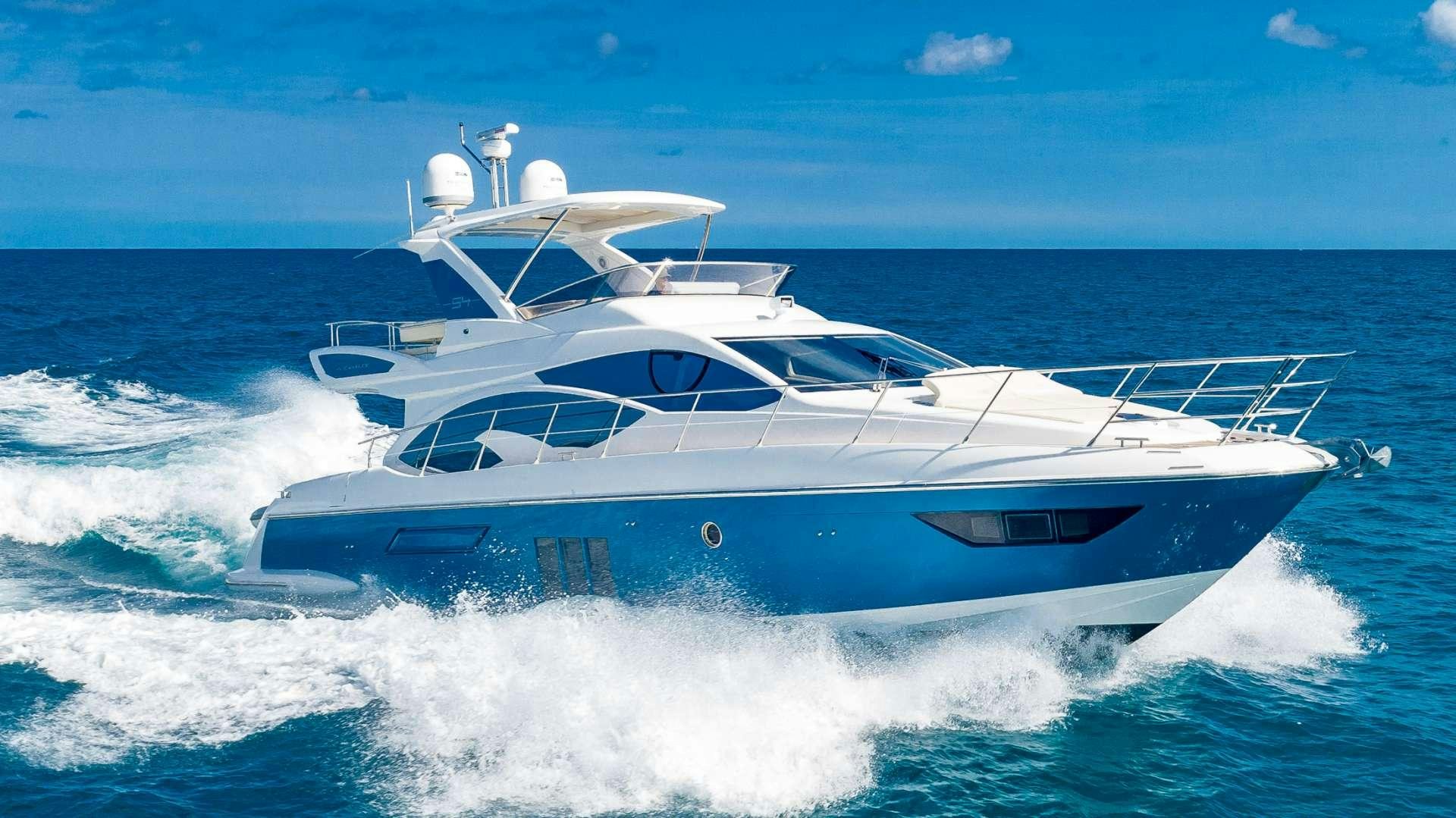 a white yacht on the water aboard ROLLIN DEEP Yacht for Charter