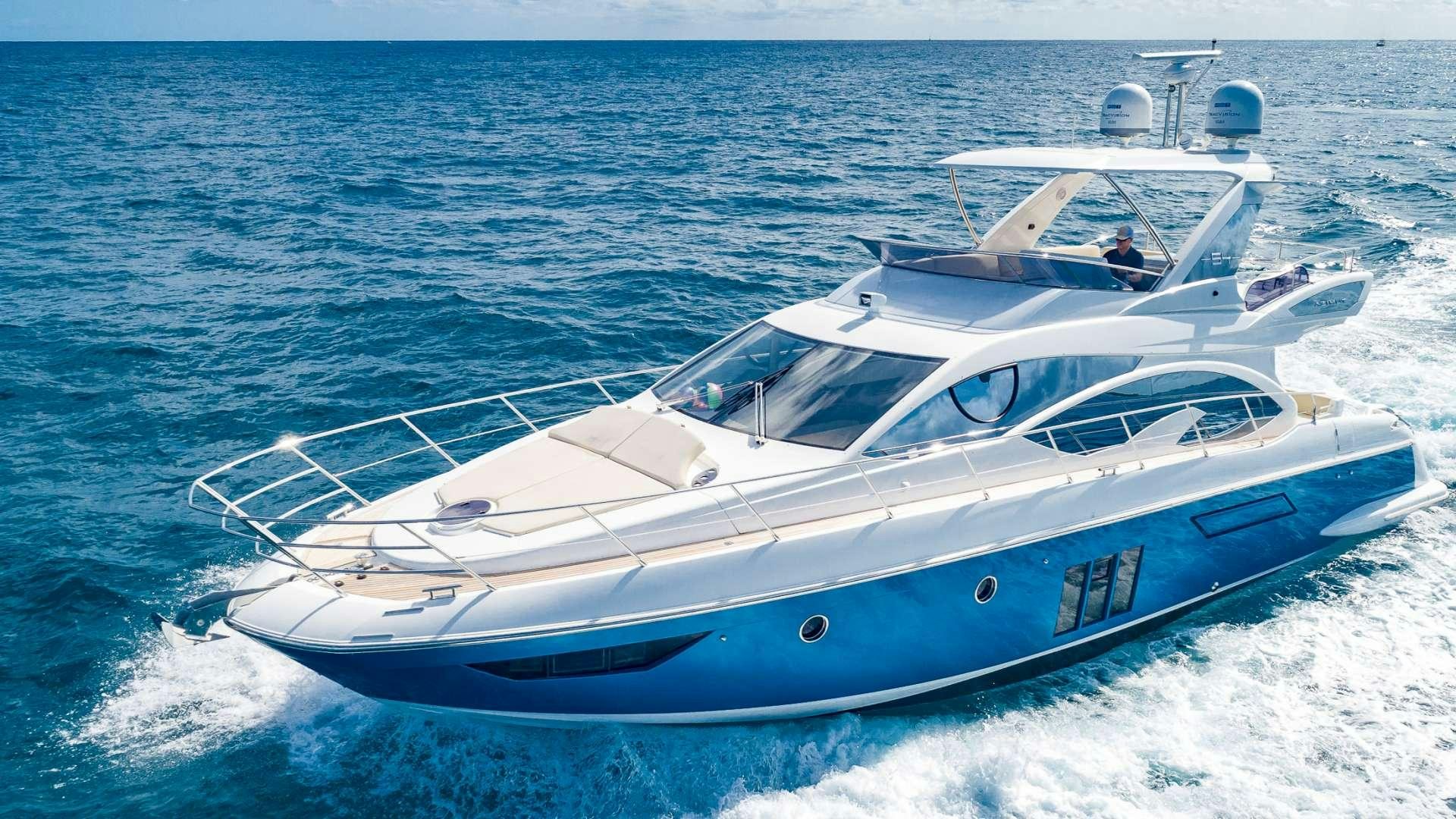 a white yacht on the water aboard ROLLIN DEEP Yacht for Charter