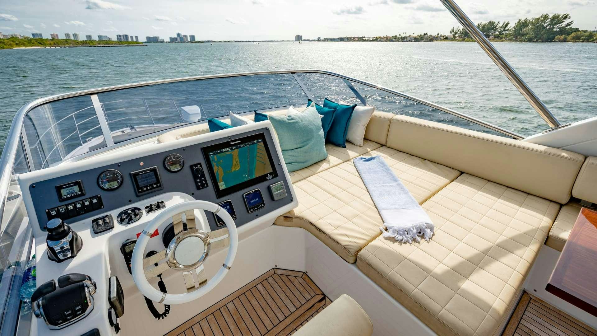 a boat with a deck and a deck and a view of the water aboard ROLLIN DEEP Yacht for Charter