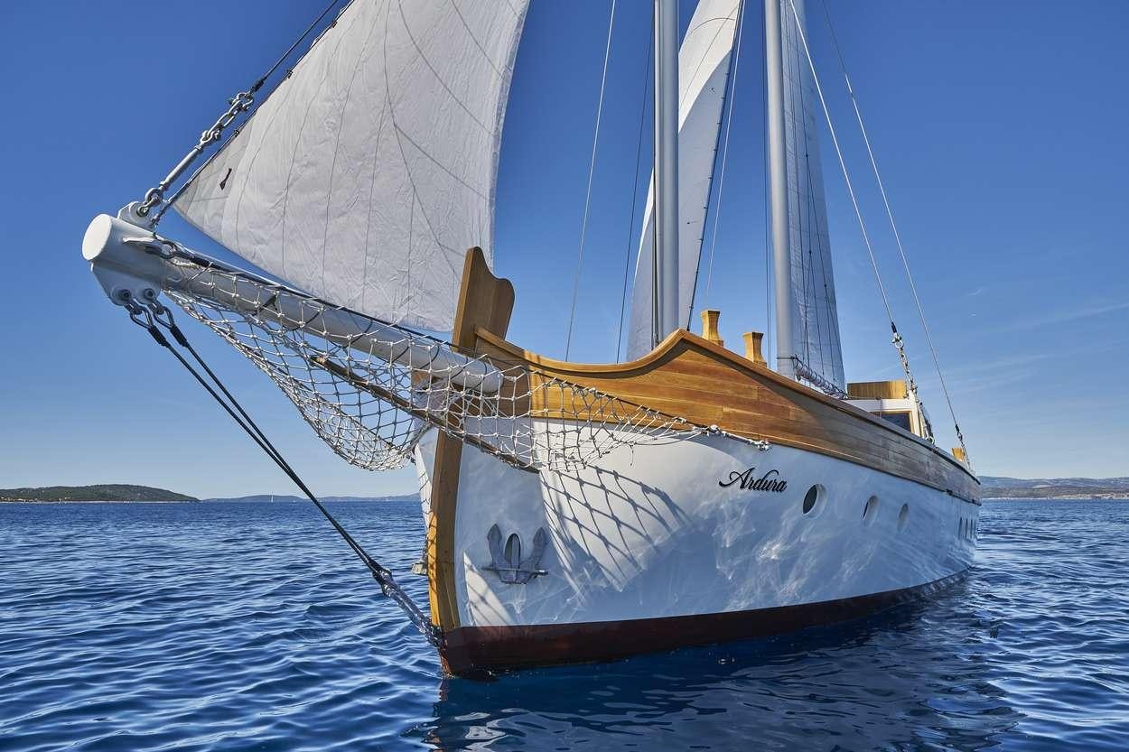 a sailboat in the water aboard ARDURA Yacht for Charter