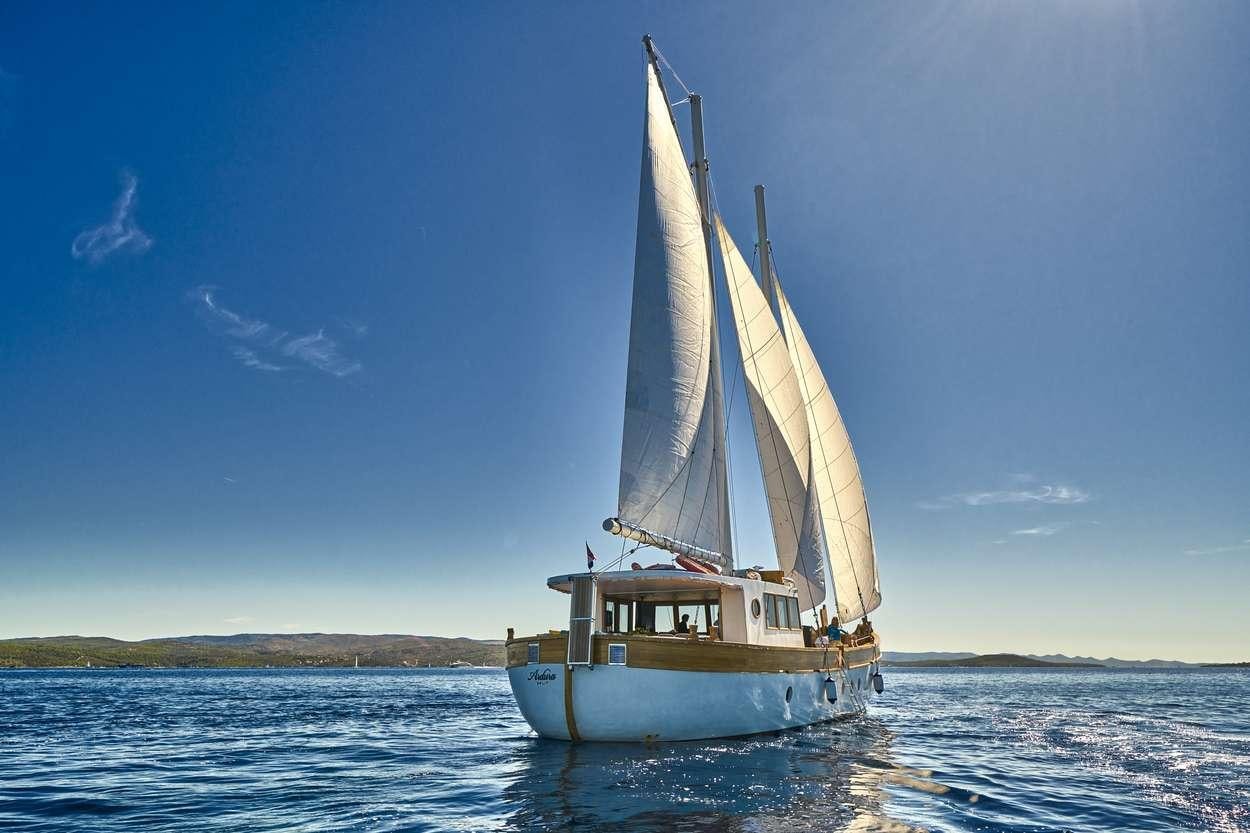 a sailboat in the water aboard ARDURA Yacht for Charter