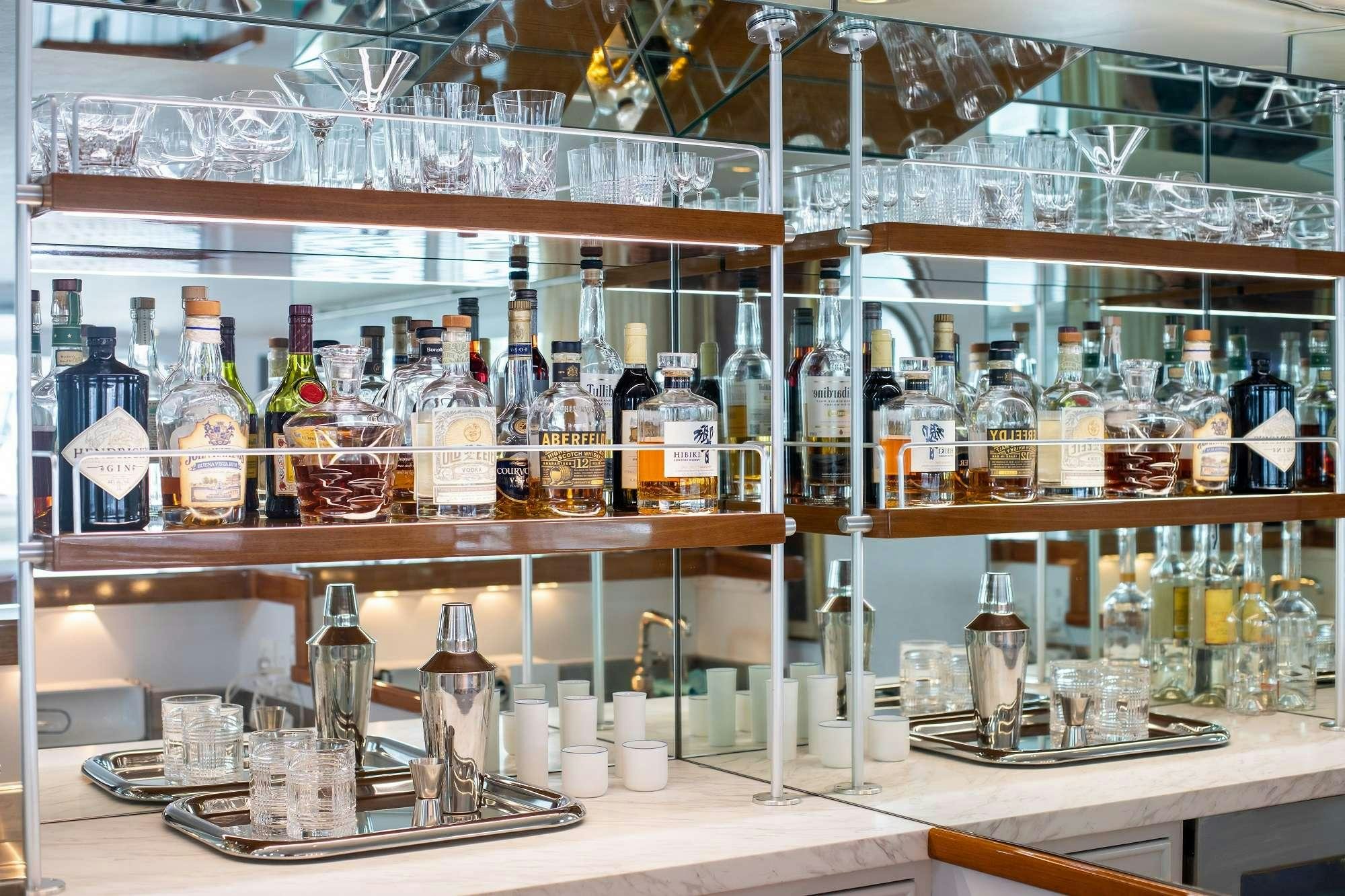 a laboratory with bottles and glasses aboard SOVEREIGN Yacht for Charter