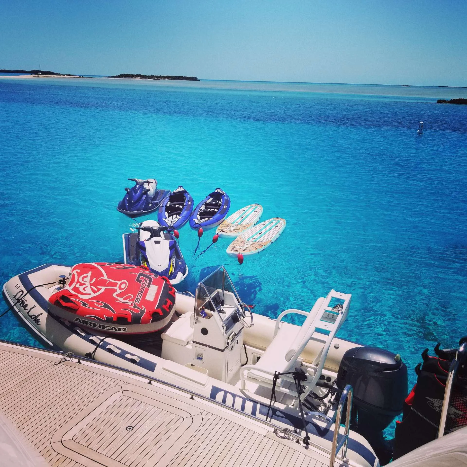 a boat with a motor attached to it aboard DONA LOLA Yacht for Charter