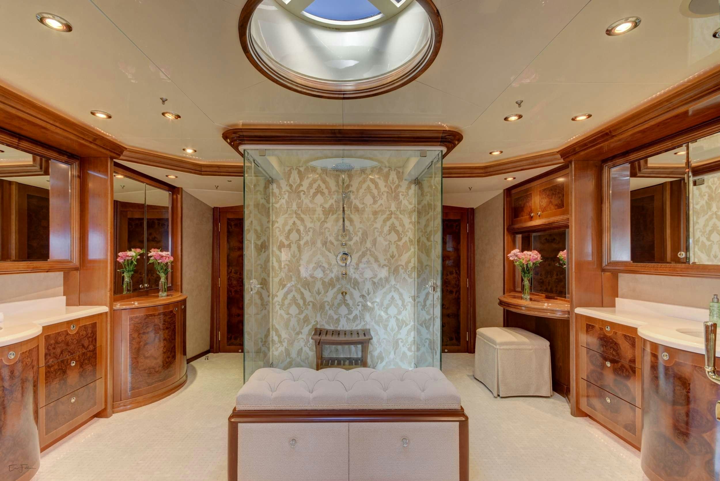 a large room with a large mirror aboard CAMILLE Yacht for Charter