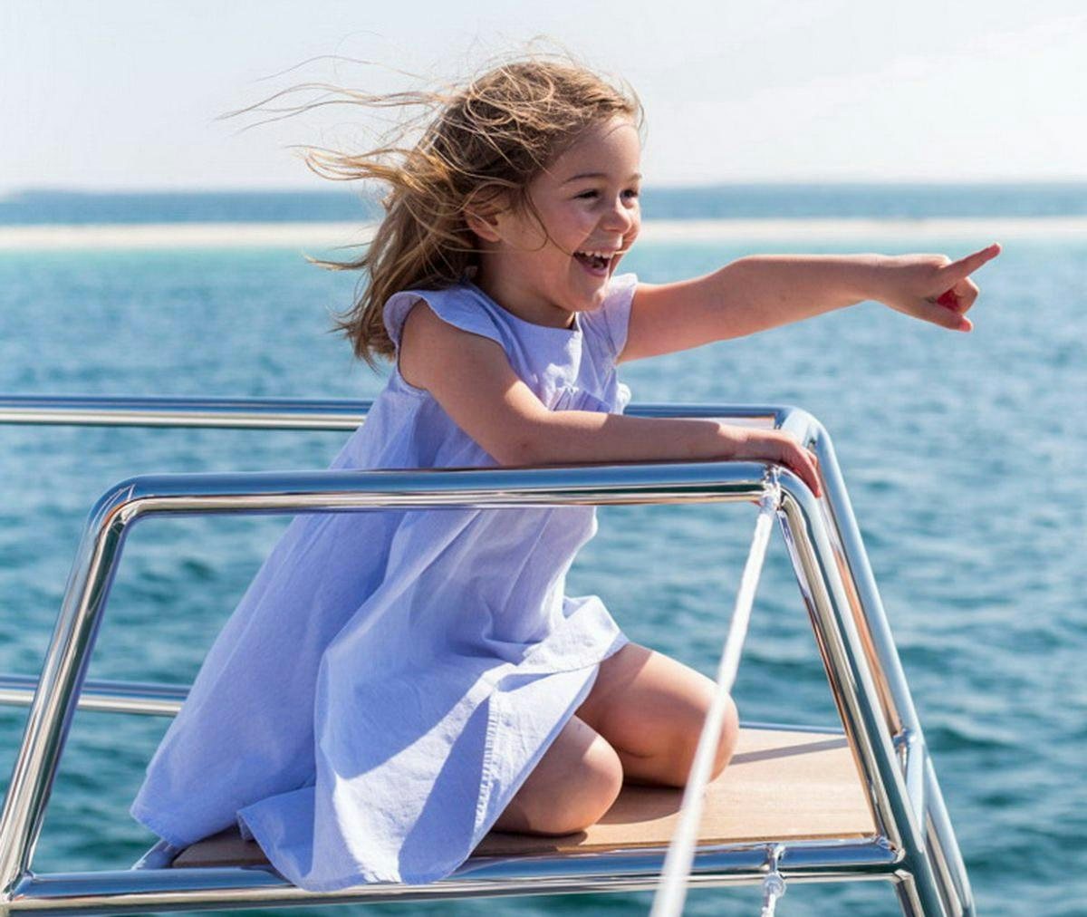 a girl on a boat aboard WINDQUEST Yacht for Charter