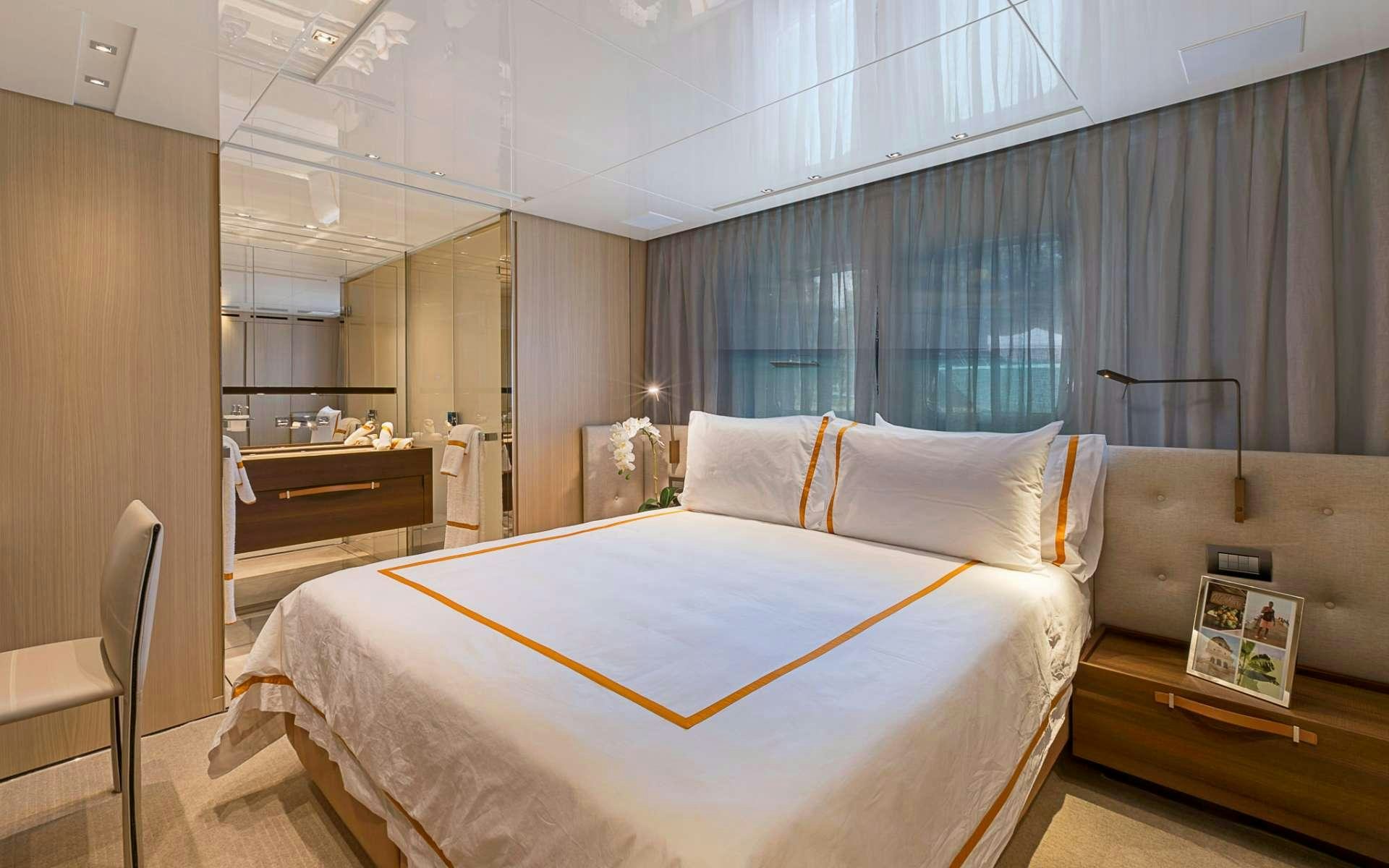 a bed in a room aboard NOTORIOUS Yacht for Charter