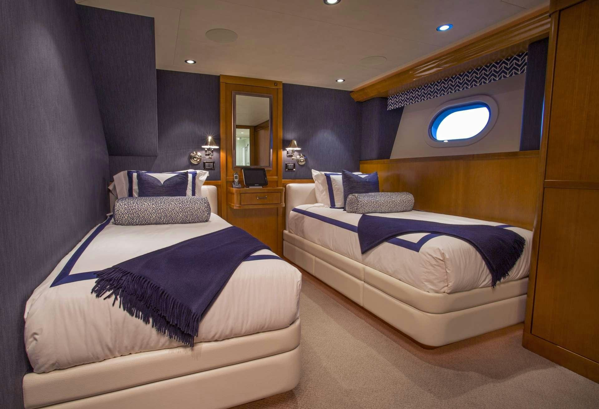 a room with two beds aboard FAR NIENTE Yacht for Charter