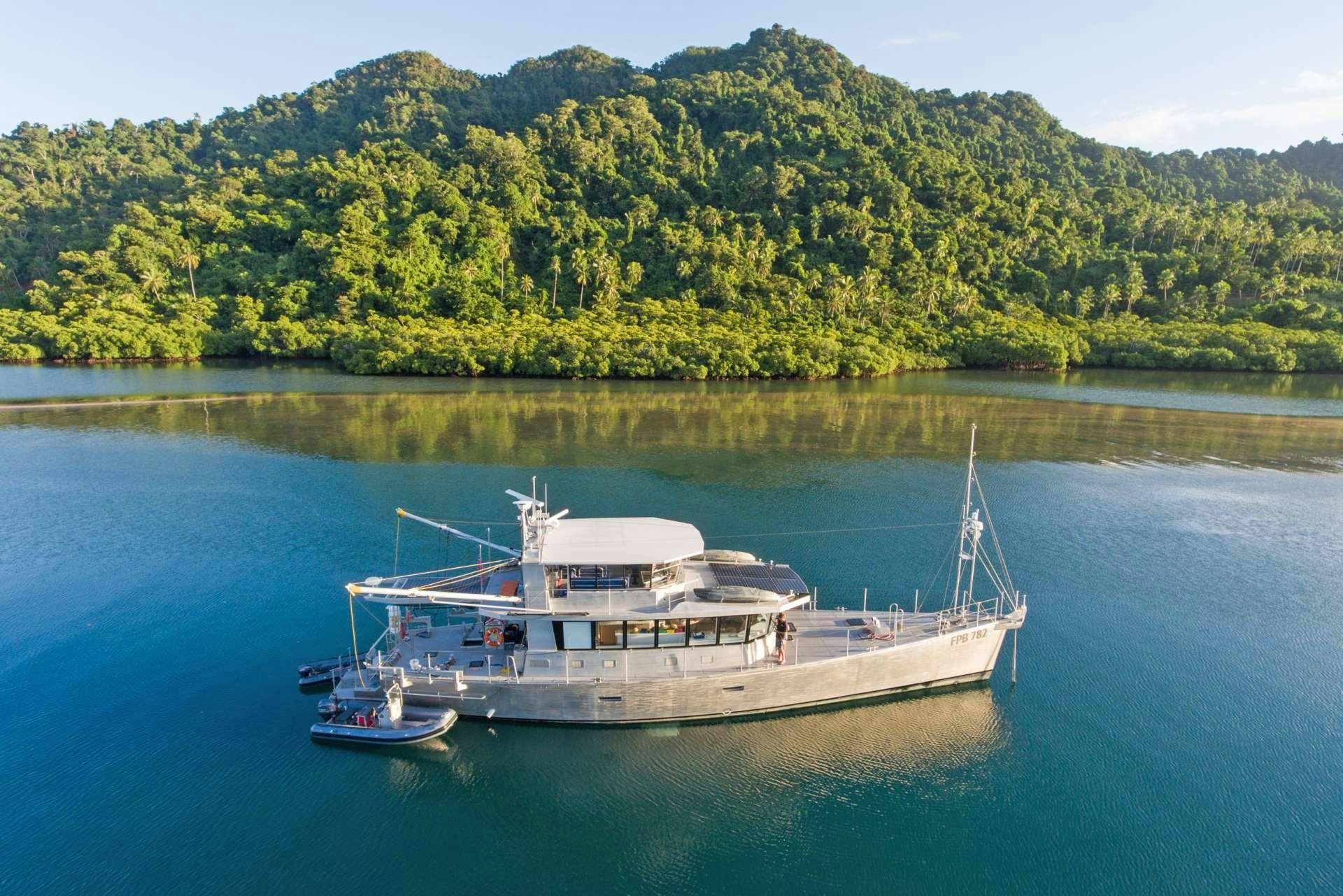 a boat on the water aboard GREY WOLF Yacht for Charter