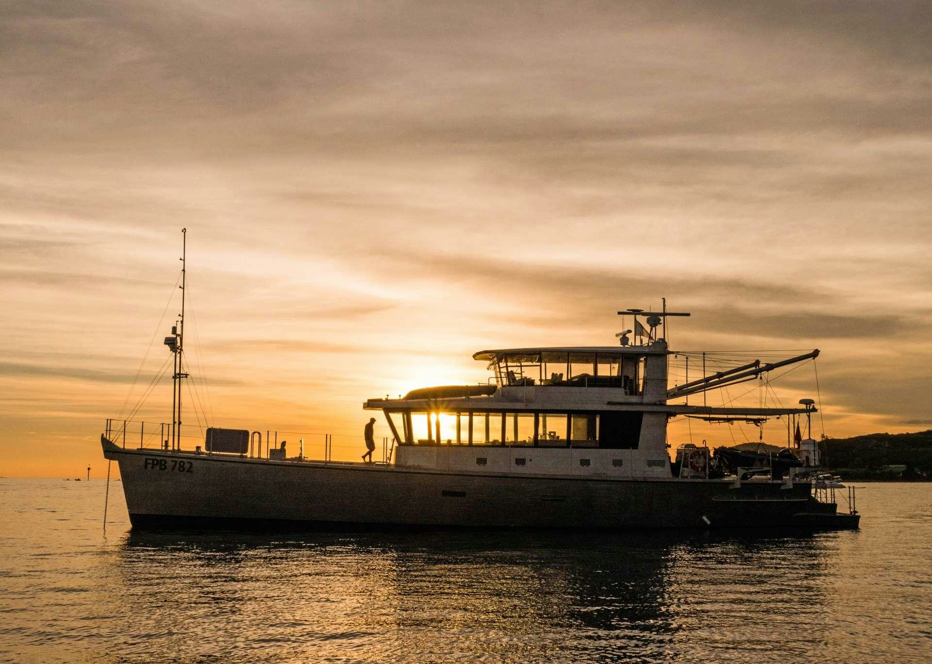 a boat on the water aboard GREY WOLF Yacht for Charter