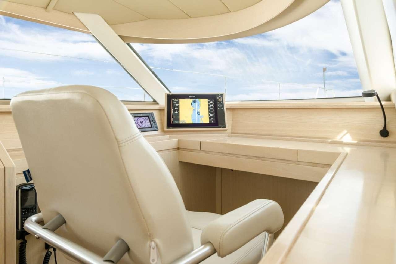 a screen on a window aboard CYGNUS CYGNUS Yacht for Charter