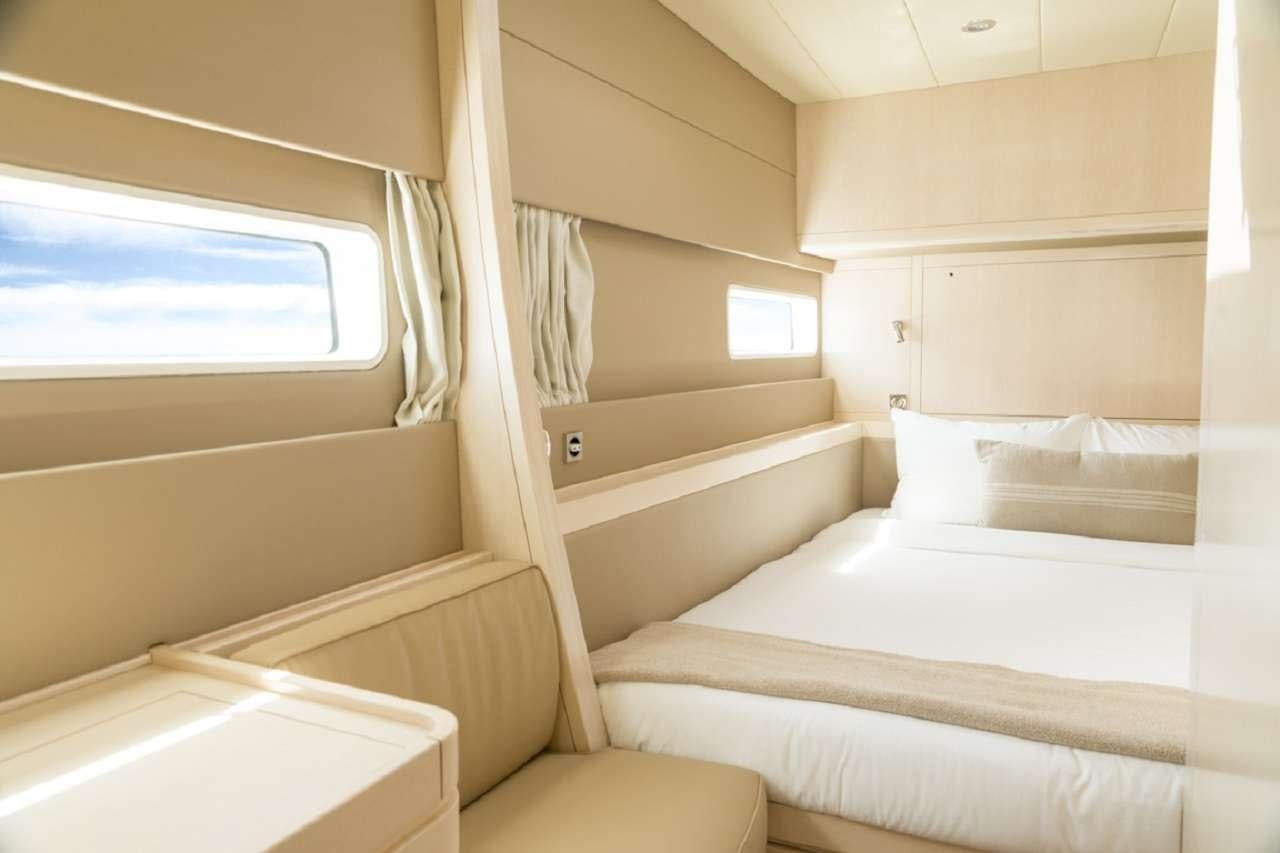 a room with bunk beds aboard CYGNUS CYGNUS Yacht for Charter