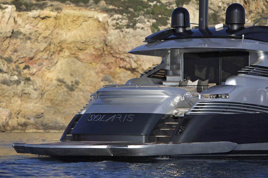 a car driving on a river aboard SOLARIS Yacht for Charter