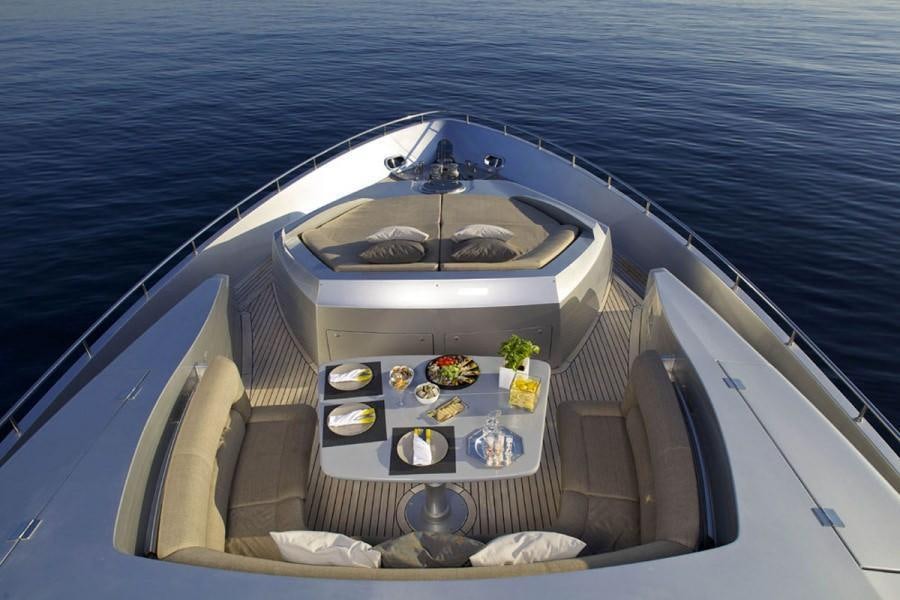 a boat with food on the water aboard SOLARIS Yacht for Charter