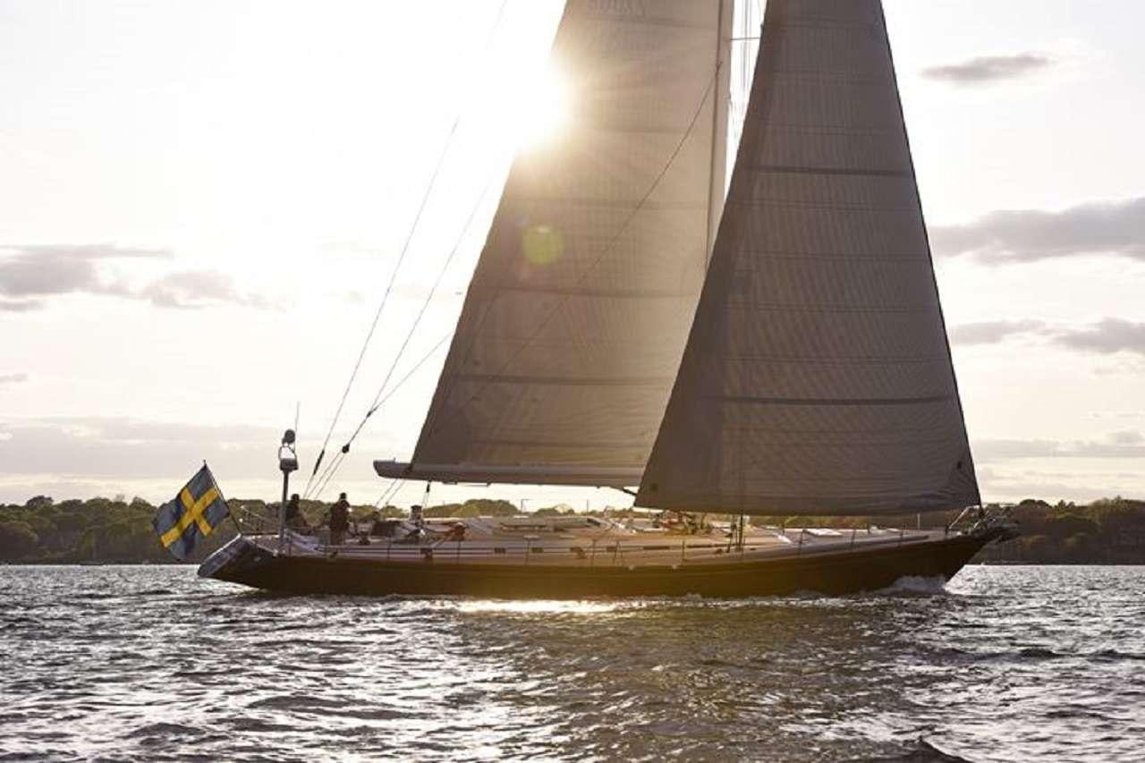 a sailboat on the water aboard aquila Yacht for Charter