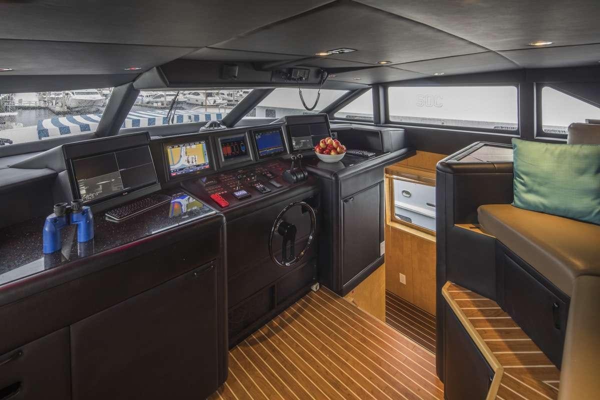 a room with many computers and electronic equipment aboard ISLAND VIBES Yacht for Charter