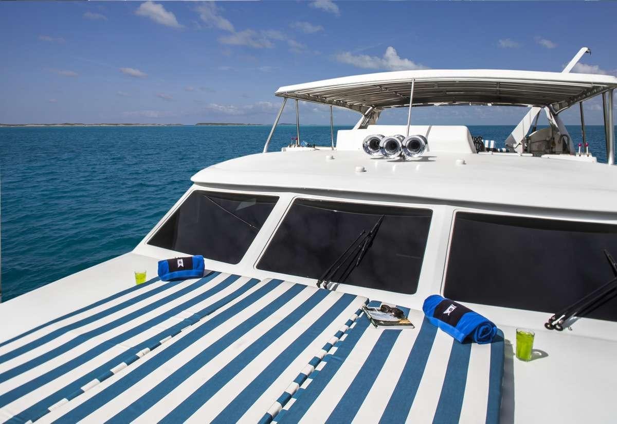 a boat on the water aboard ISLAND VIBES Yacht for Charter