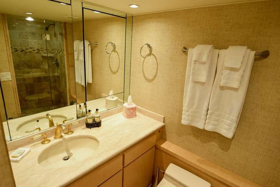 a bathroom with a large mirror aboard ISLAND VIBES Yacht for Charter